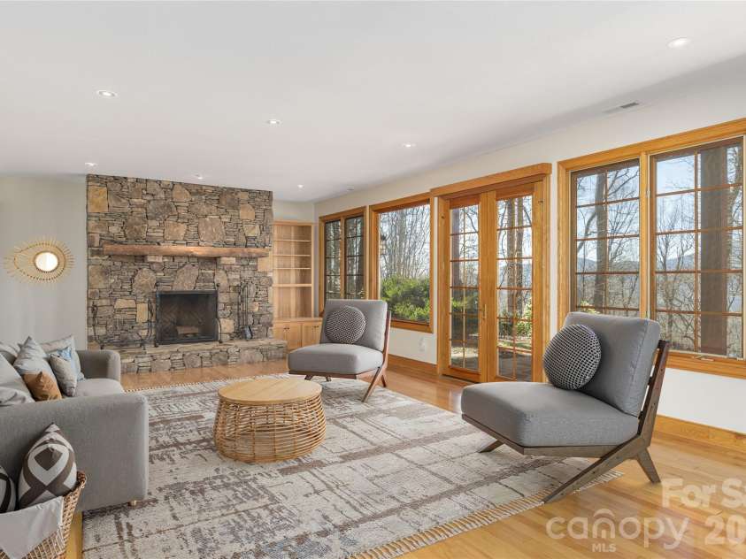 98 Flat Creek Road, Fairview, NC 28730.  MLS# CAR4395536, YatesRealty ID 38996. Virtually furnished Family Room
