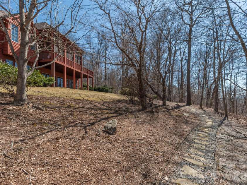 98 Flat Creek Road, Fairview, NC 28730.  MLS# CAR4395536, YatesRealty ID 38996. Walkable garden paths