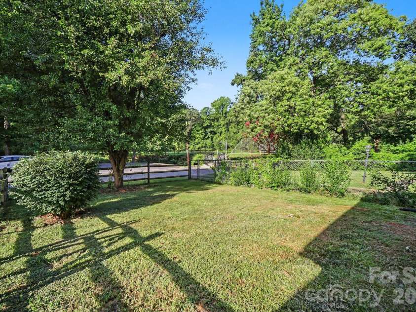 3960 Bristol Drive, Charlotte, NC 28208.  MLS# CAR4397608, YatesRealty ID 39001. Front yard view to Park