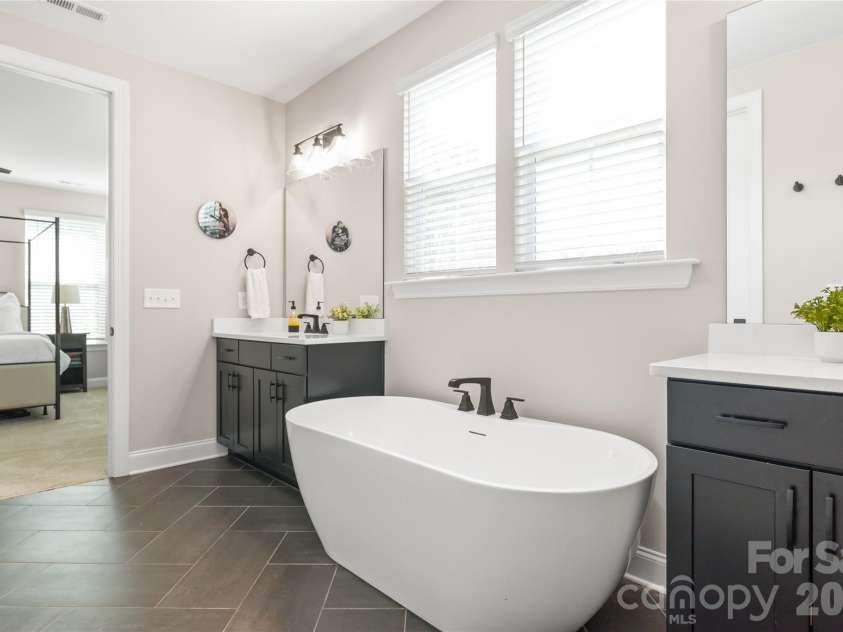 3213 Timber Run Lane, Maiden, NC 28650.  MLS# CAR4371806, YatesRealty ID 39002. Step into a luxury en-suite designed for total relaxation. Featuring designer finishes, a spacious layout, and a custom feel.
