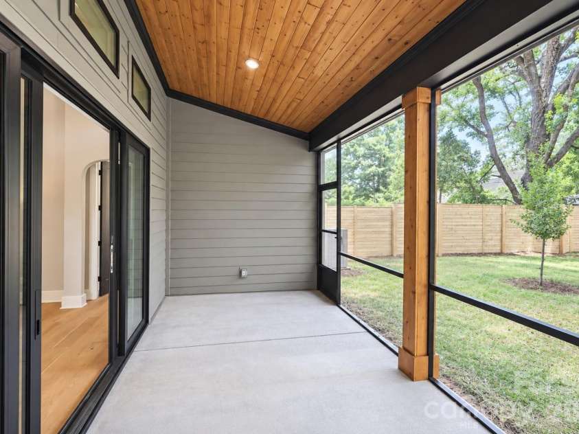 442 Sylvania Avenue, Charlotte, NC 28206.  MLS# CAR4381859, YatesRealty ID 39004. Screened porch