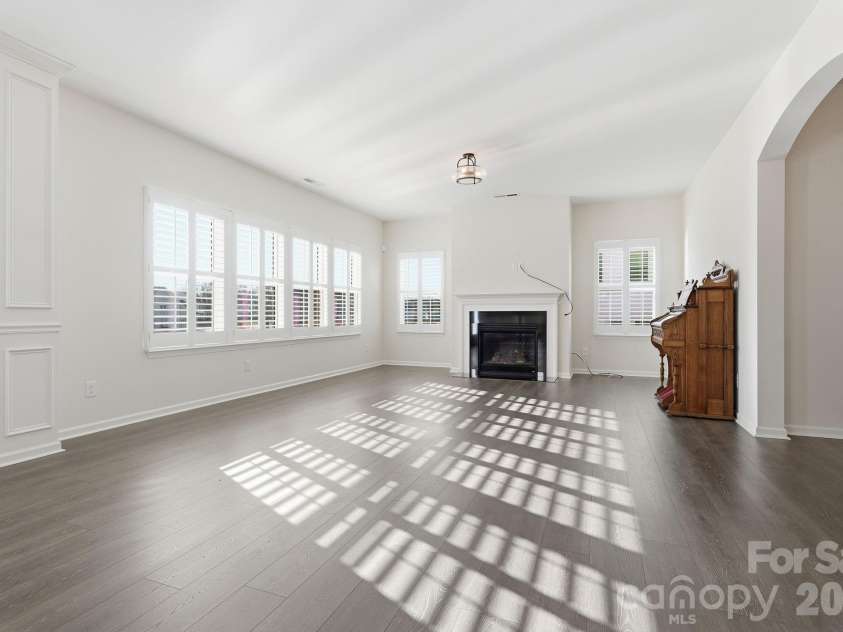 1504 Brooksland Place, Waxhaw, NC 28173.  MLS# CAR4347761, YatesRealty ID 3901. Living Room with Gas Fireplace