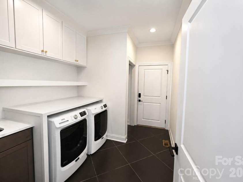 3793 Sarazen Court, Conover, NC 28613.  MLS# CAR4406224, YatesRealty ID 39016. Laundry Room