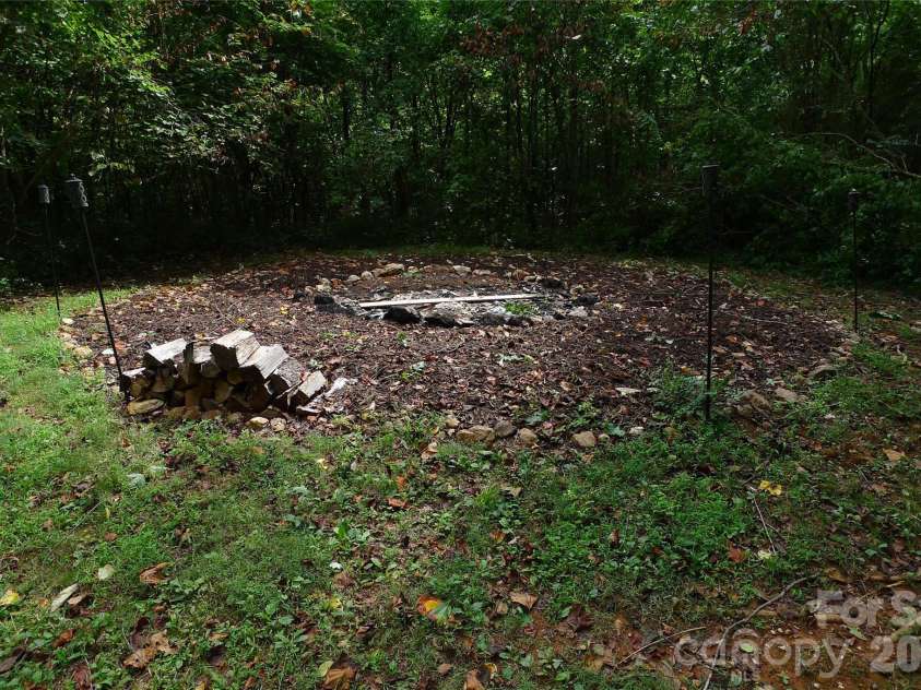 241 Grannaman Drive, Mocksville, NC 27028.  MLS# CAR4406242, YatesRealty ID 39017. Fire pit