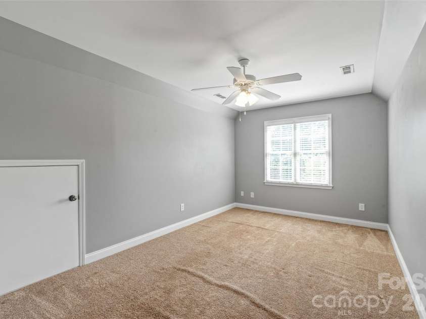 1006 Strawberry Lane, Gastonia, NC 28054.  MLS# CAR4372022, YatesRealty ID 39018. Bedroom 3 with attic access