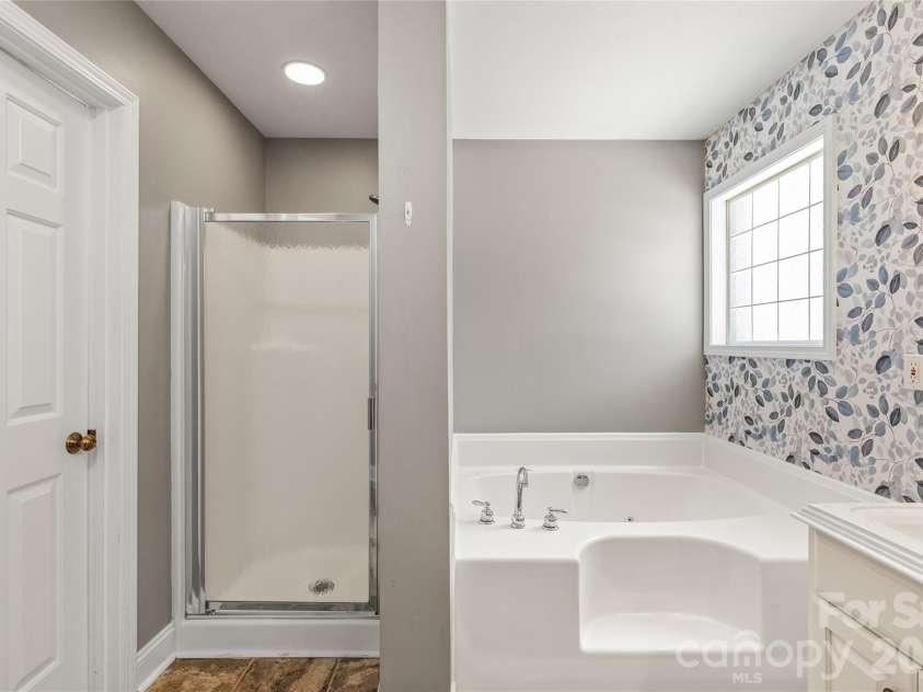 1006 Strawberry Lane, Gastonia, NC 28054.  MLS# CAR4372022, YatesRealty ID 39018. Primary Bathroom with separate shower