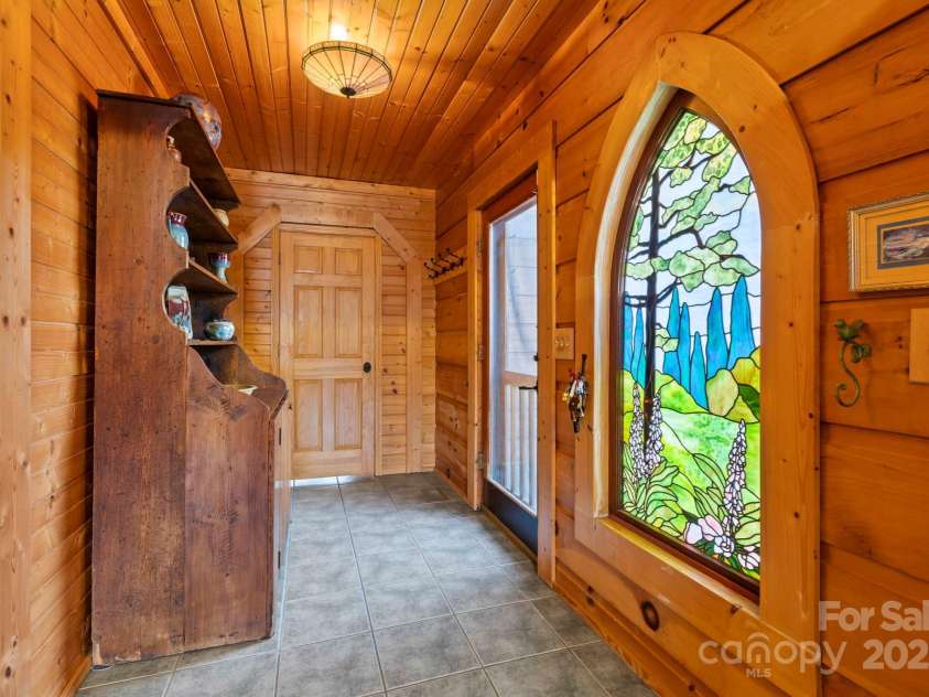 104 Enthoffer Street, Black Mountain, NC 28711.  MLS# CAR4328758, YatesRealty ID 3902. Back house foyer