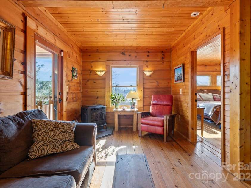 104 Enthoffer Street, Black Mountain, NC 28711.  MLS# CAR4328758, YatesRealty ID 3902. Back house living room