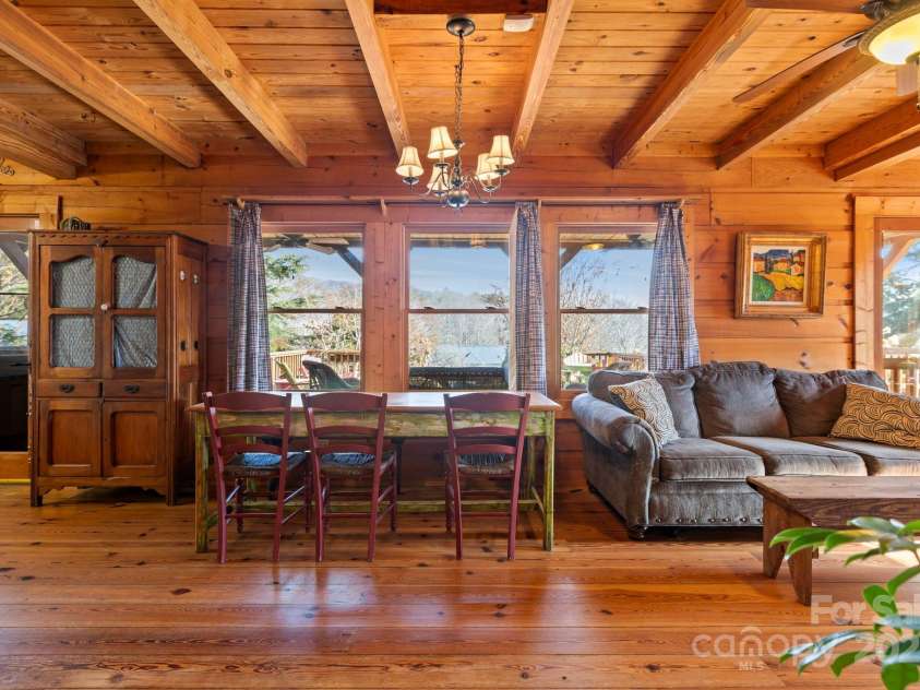 104 Enthoffer Street, Black Mountain, NC 28711.  MLS# CAR4328758, YatesRealty ID 3902. Back house living/dining area