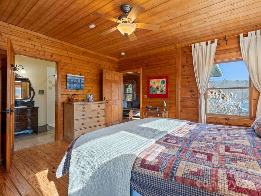 104 Enthoffer Street, Black Mountain, NC 28711.  MLS# CAR4328758, YatesRealty ID 3902. Back house primary bedroom