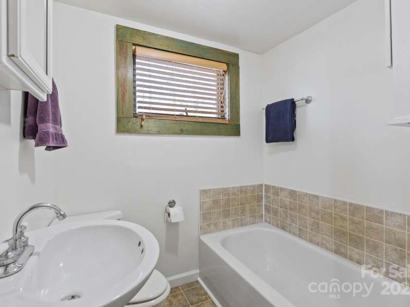 104 Enthoffer Street, Black Mountain, NC 28711.  MLS# CAR4328758, YatesRealty ID 3902. Front house bathroom