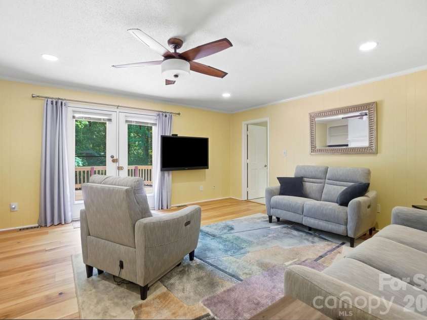 701 Blue Rock Drive, Charlotte, NC 28213.  MLS# CAR4395254, YatesRealty ID 39020. Access the deck from the spacious family room