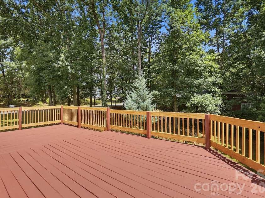 701 Blue Rock Drive, Charlotte, NC 28213.  MLS# CAR4395254, YatesRealty ID 39020. Large freshly stained deck