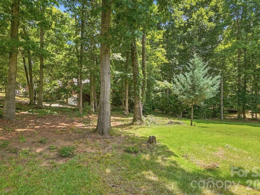 701 Blue Rock Drive, Charlotte, NC 28213.  MLS# CAR4395254, YatesRealty ID 39020. Mature trees