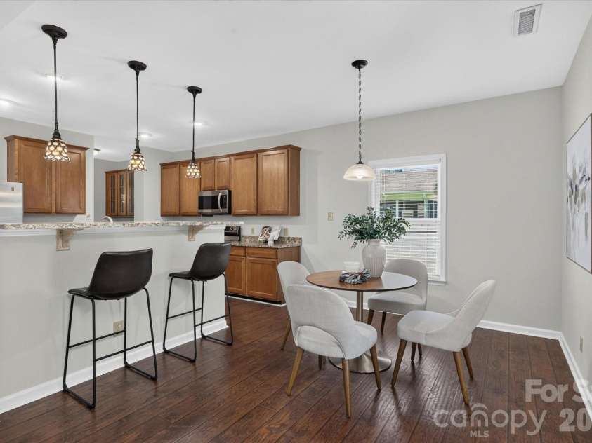 6042 Laurent Avenue, Fort Mill, SC 29715.  MLS# CAR4403776, YatesRealty ID 39033. Dinette + Breakfast Bar