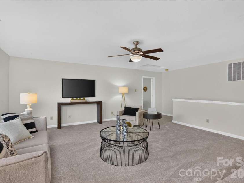 6042 Laurent Avenue, Fort Mill, SC 29715.  MLS# CAR4403776, YatesRealty ID 39033. Entertainment space