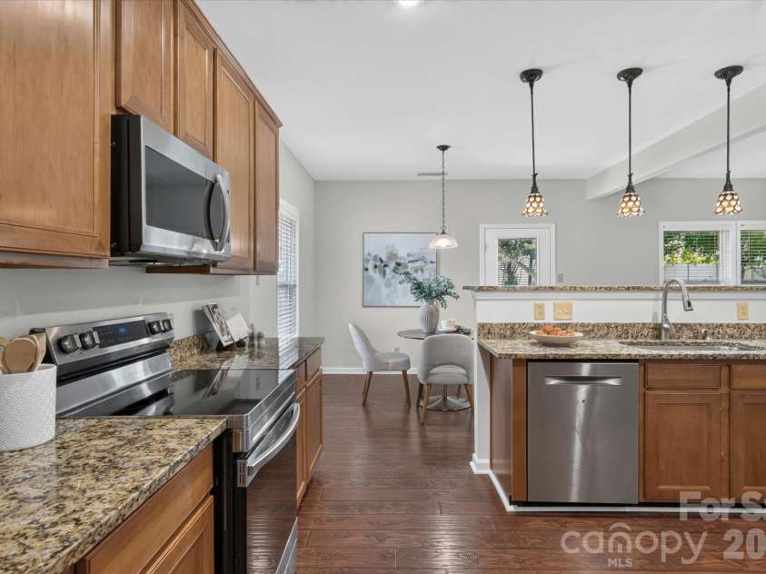 6042 Laurent Avenue, Fort Mill, SC 29715.  MLS# CAR4403776, YatesRealty ID 39033. Newer range and microwave