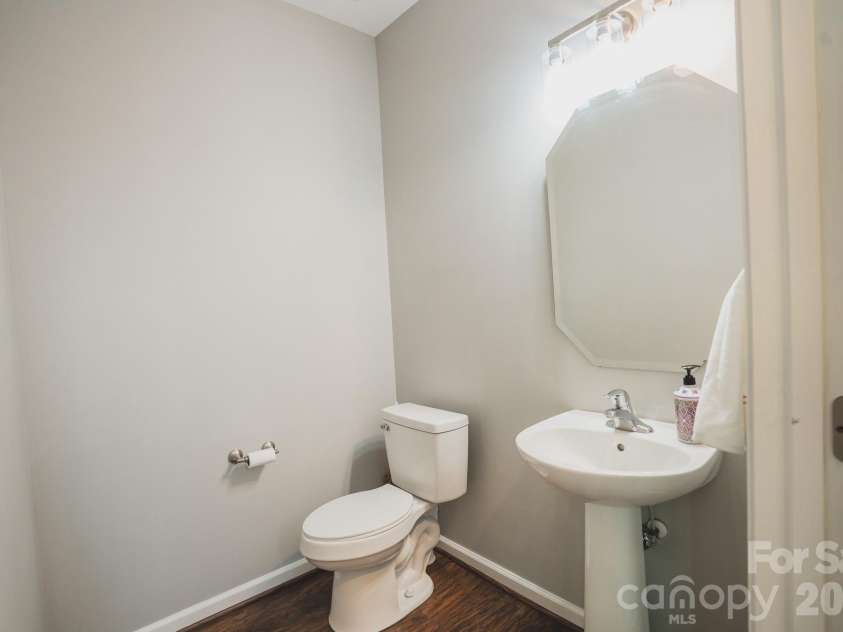 7051 Brighton Park Drive, Charlotte, NC 28227.  MLS# CAR4399270, YatesRealty ID 39034. A 1/2  bathroom  on the lower level