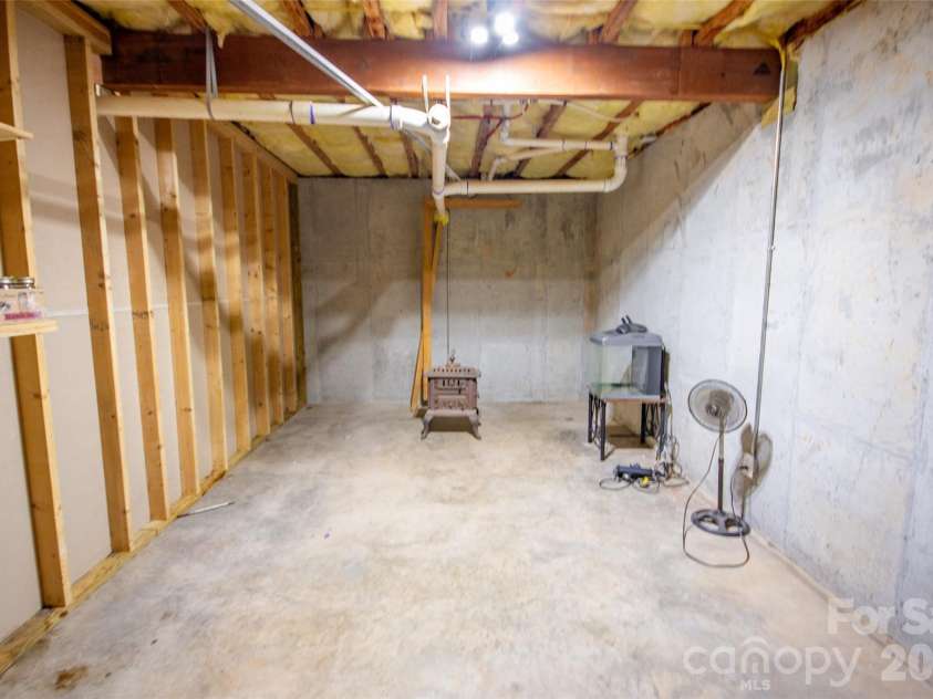 588 Abbeydale Road, Harmony, NC 28634.  MLS# CAR4403987, YatesRealty ID 39036. Additional flex/storage room in basement