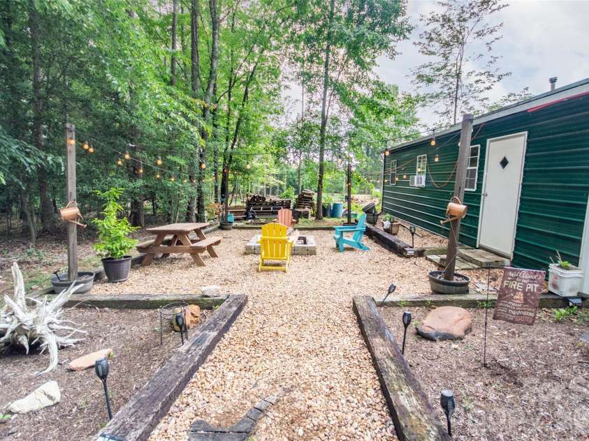 588 Abbeydale Road, Harmony, NC 28634.  MLS# CAR4403987, YatesRealty ID 39036. Peaceful firepit area