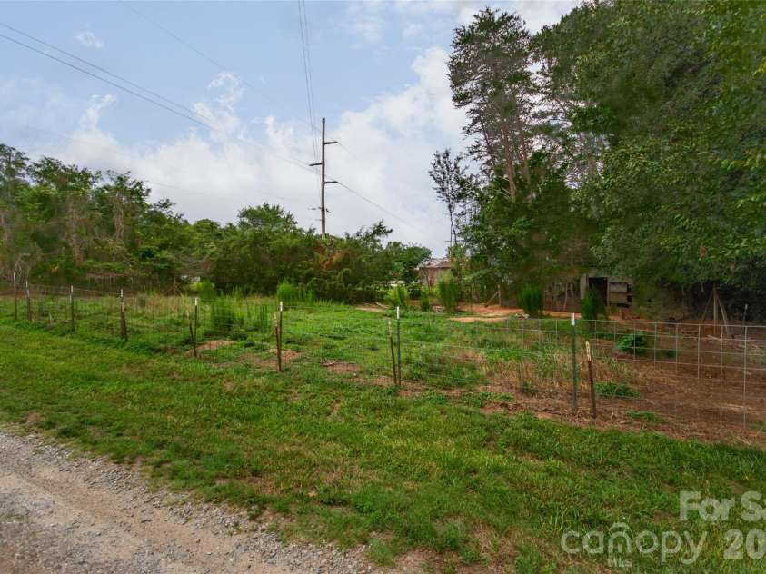 588 Abbeydale Road, Harmony, NC 28634.  MLS# CAR4403987, YatesRealty ID 39036. Small pasture area with Donkey shed.