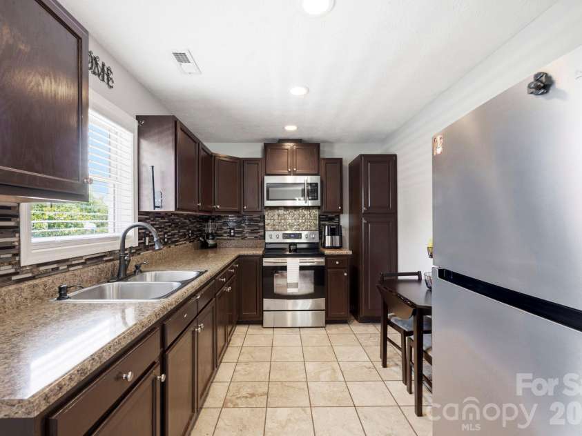 51 Kay Thomas Drive, Hendersonville, NC 28792.  MLS# CAR4406229, YatesRealty ID 39037. 