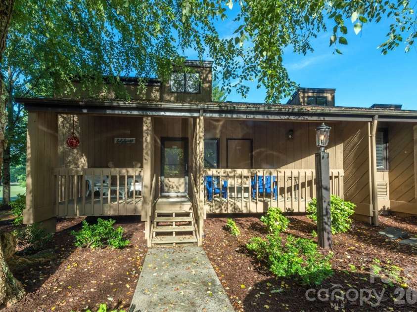 156 Lake Drive, Lake Lure, NC 28746.  MLS# CAR4406437, YatesRealty ID 39040. 