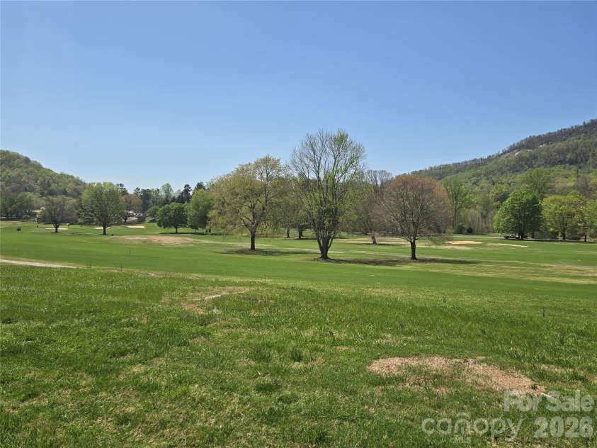 156 Lake Drive, Lake Lure, NC 28746.  MLS# CAR4406437, YatesRealty ID 39040. 