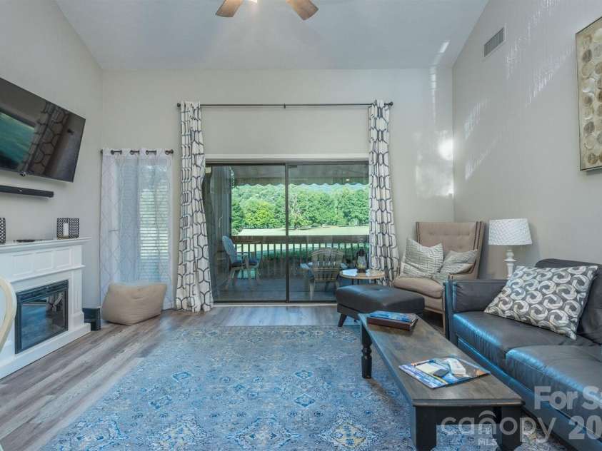 156 Lake Drive, Lake Lure, NC 28746.  MLS# CAR4406437, YatesRealty ID 39040. 