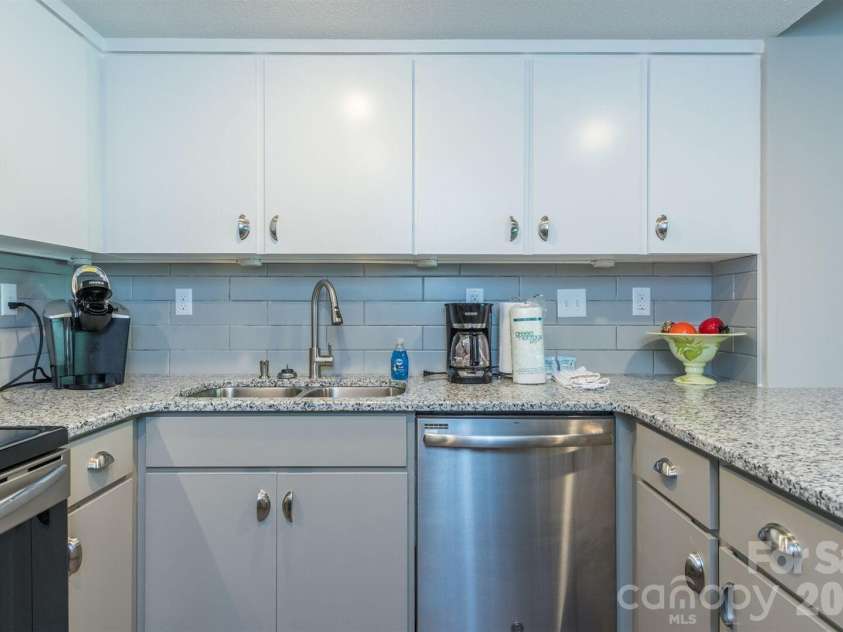 156 Lake Drive, Lake Lure, NC 28746.  MLS# CAR4406437, YatesRealty ID 39040. 