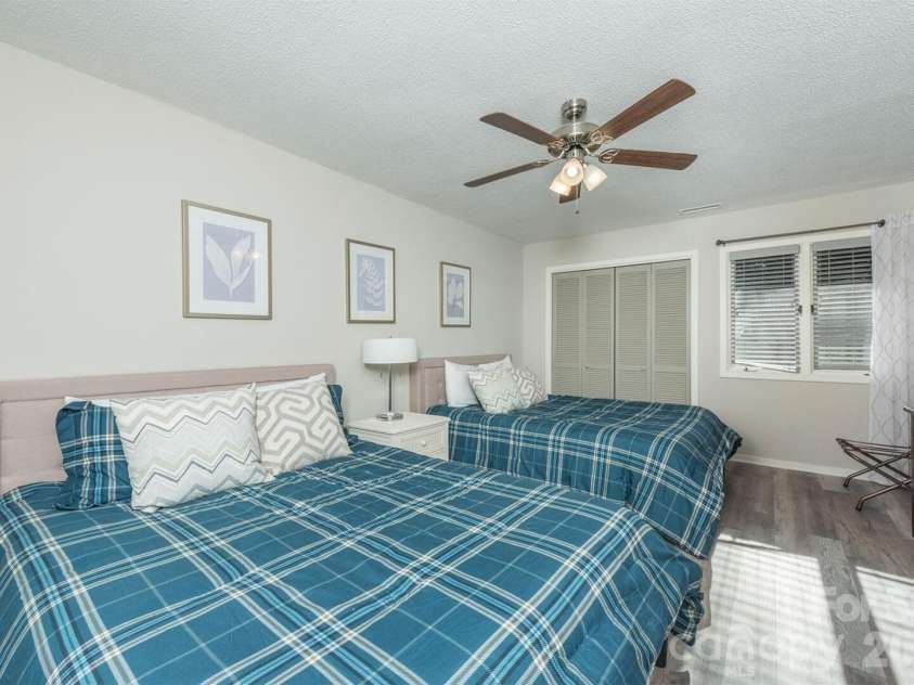 156 Lake Drive, Lake Lure, NC 28746.  MLS# CAR4406437, YatesRealty ID 39040. 