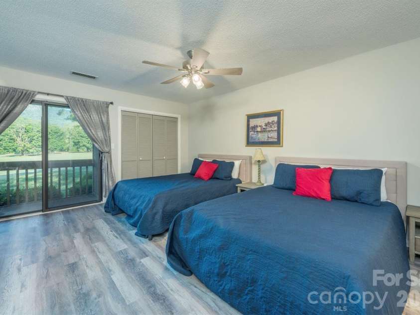 156 Lake Drive, Lake Lure, NC 28746.  MLS# CAR4406437, YatesRealty ID 39040. 