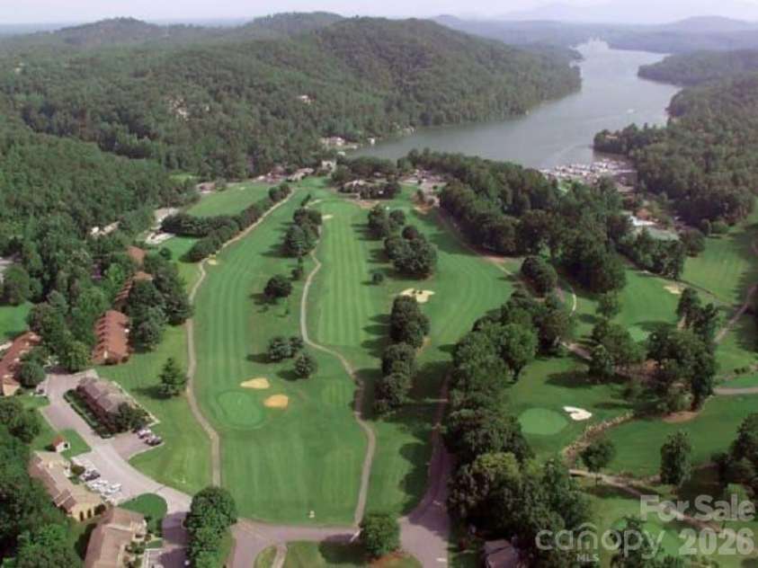 156 Lake Drive, Lake Lure, NC 28746.  MLS# CAR4406437, YatesRealty ID 39040. 