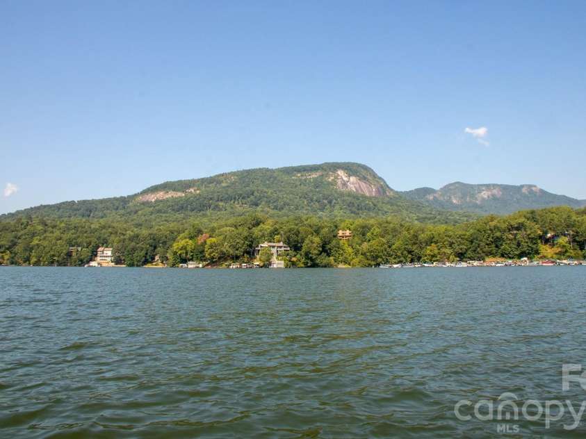 156 Lake Drive, Lake Lure, NC 28746.  MLS# CAR4406437, YatesRealty ID 39040. 
