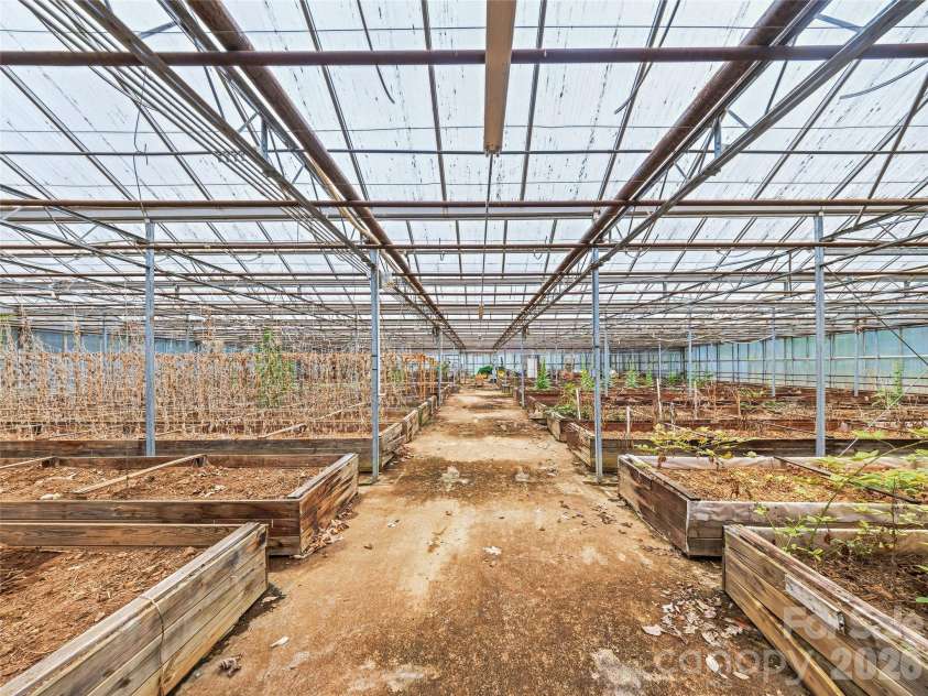 961 Wilson Branch Road, Mars Hill, NC 28754.  MLS# CAR4406664, YatesRealty ID 39042. Greenhouse