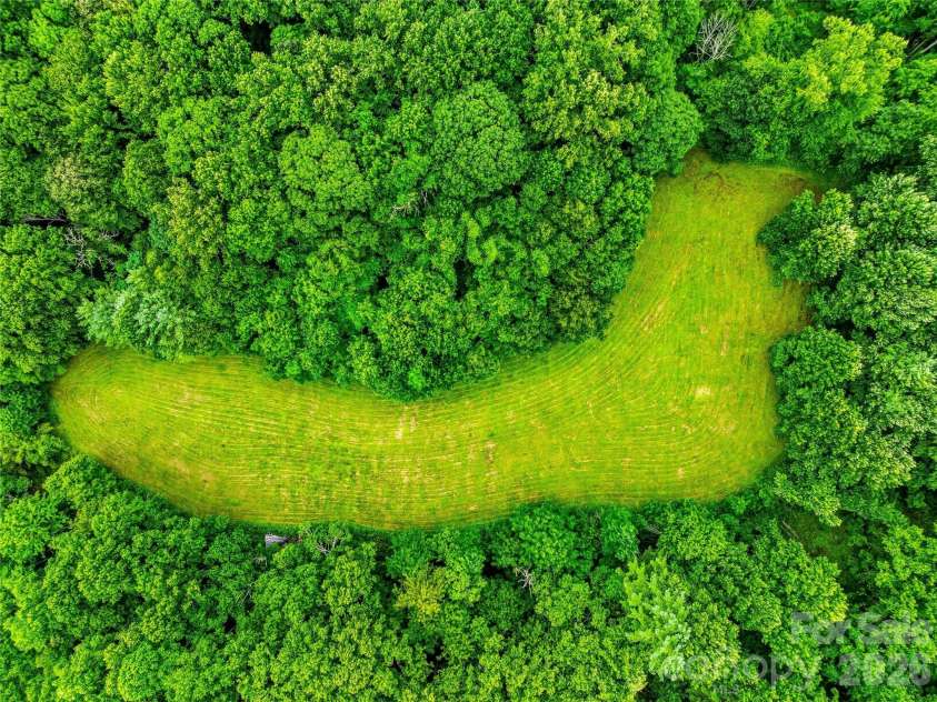 961 Wilson Branch Road, Mars Hill, NC 28754.  MLS# CAR4406664, YatesRealty ID 39042. Overhead of pasture