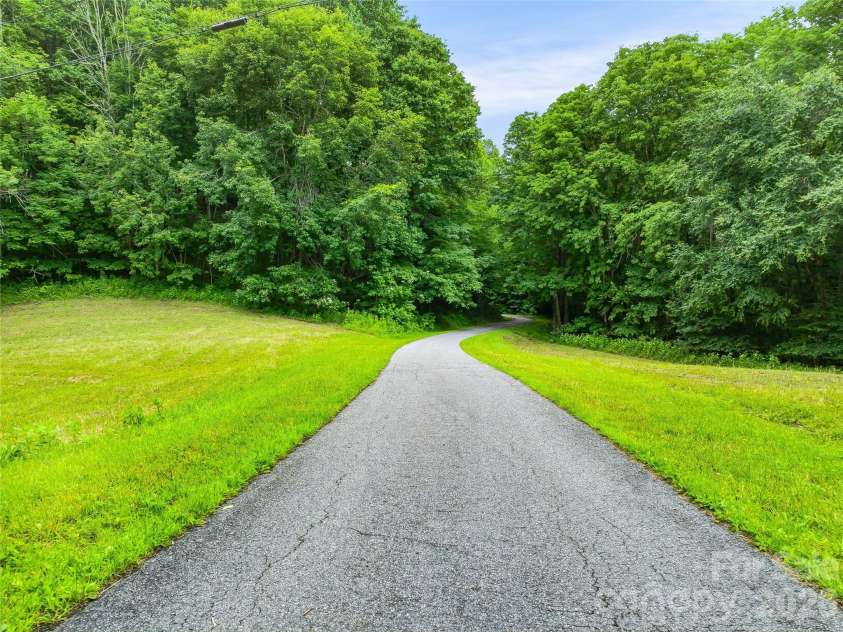 961 Wilson Branch Road, Mars Hill, NC 28754.  MLS# CAR4406664, YatesRealty ID 39042. Paved roads