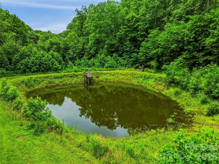 961 Wilson Branch Road, Mars Hill, NC 28754.  MLS# CAR4406664, YatesRealty ID 39042. Pond