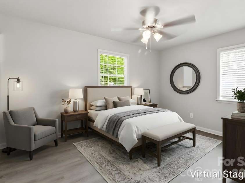 2121 Longleaf Drive, Charlotte, NC 28210.  MLS# CAR4400199, YatesRealty ID 39044. Walking into the primary bedroom (virtually staged & enhanced).