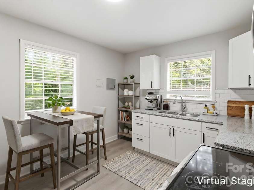 2121 Longleaf Drive, Charlotte, NC 28210.  MLS# CAR4400199, YatesRealty ID 39044. Walking into your updated kitchen (virtually staged & enhanced).