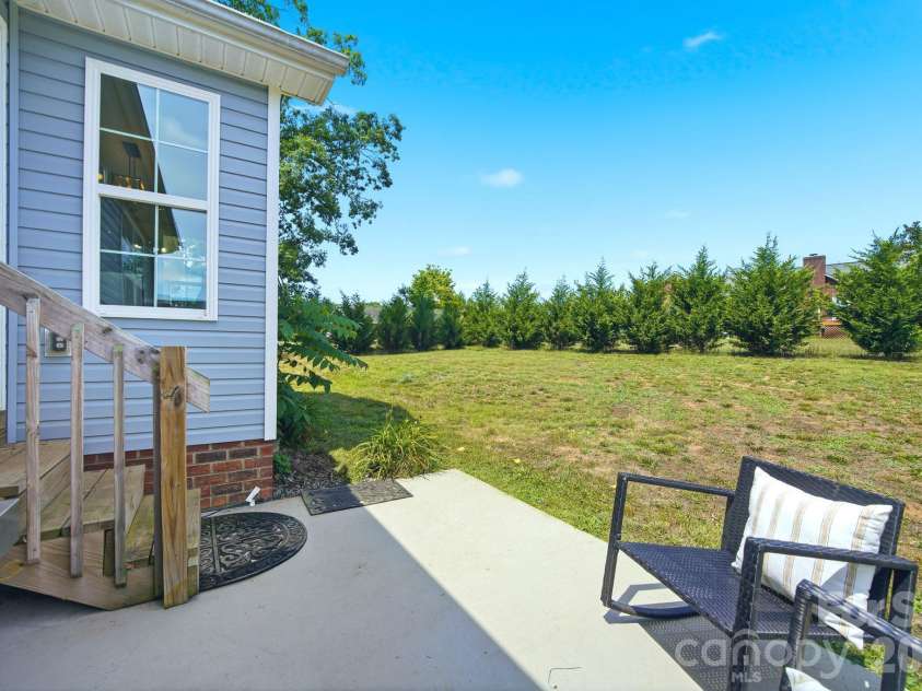 105 Hidden Spring Drive, Salisbury, NC 28147.  MLS# CAR4398555, YatesRealty ID 39046. Back Patio Built for Grilling and Entertaining