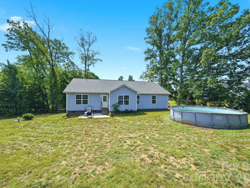 105 Hidden Spring Drive, Salisbury, NC 28147.  MLS# CAR4398555, YatesRealty ID 39046. Large Backyard and Above Ground Pool