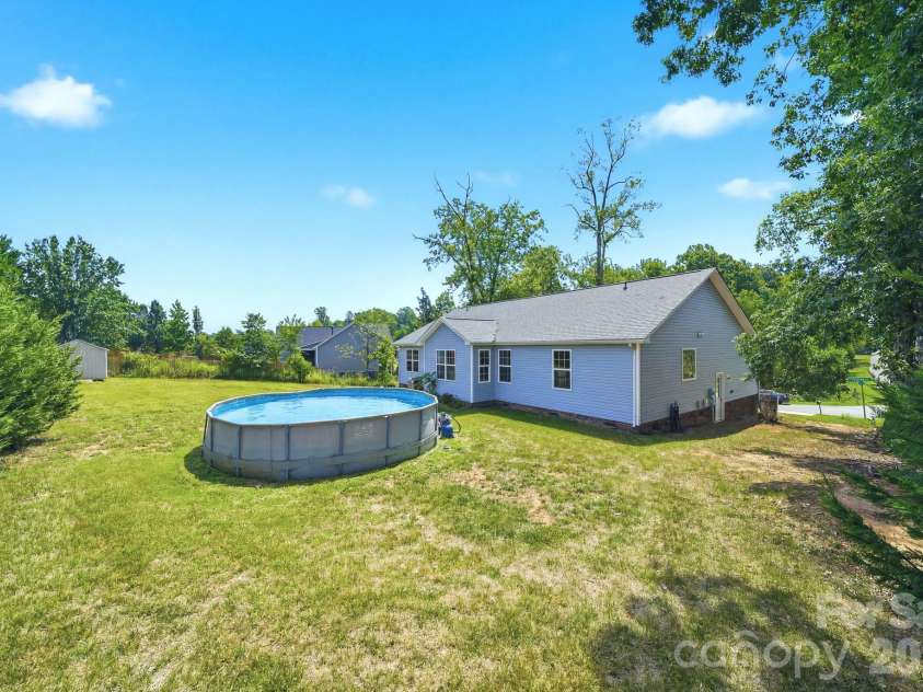 105 Hidden Spring Drive, Salisbury, NC 28147.  MLS# CAR4398555, YatesRealty ID 39046. Large Backyard and Above Ground Pool