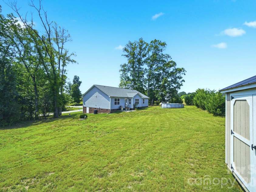 105 Hidden Spring Drive, Salisbury, NC 28147.  MLS# CAR4398555, YatesRealty ID 39046. Large Backyard and Above Ground Pool