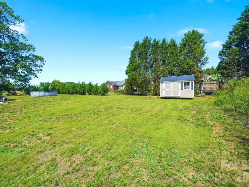 105 Hidden Spring Drive, Salisbury, NC 28147.  MLS# CAR4398555, YatesRealty ID 39046. Large Backyard and Above Ground Pool