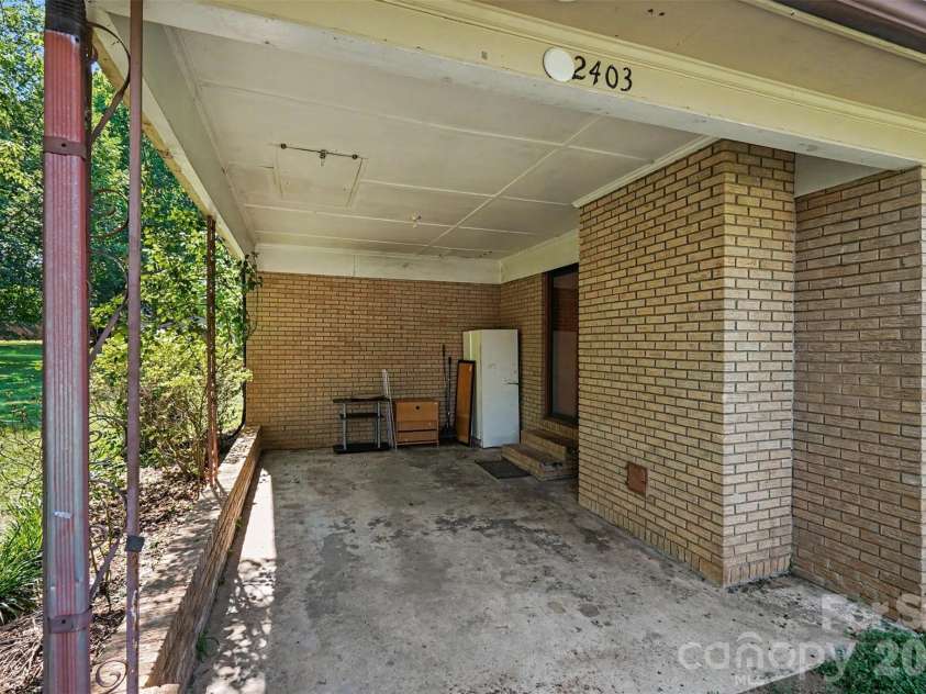 2403 Chevaron Drive, Concord, NC 28025.  MLS# CAR4392827, YatesRealty ID 39047. Carport