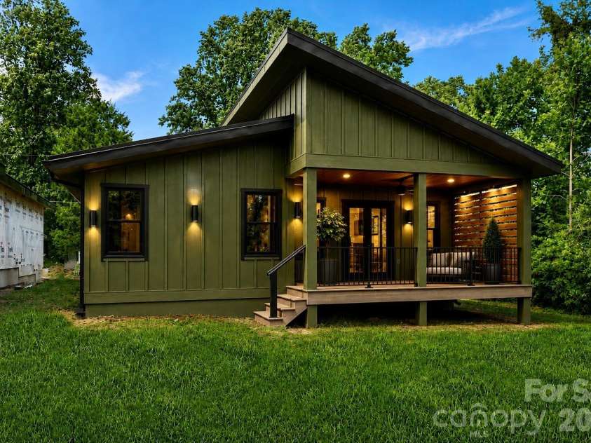 133 Welcome Street, Brevard, NC 28712.  MLS# CAR4401464, YatesRealty ID 39048. Back yard has green space behind