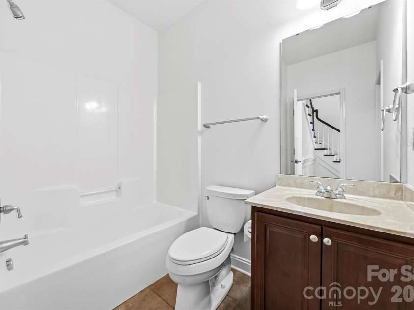 1703 Caddy Court, Matthews, NC 28104.  MLS# CAR4392423, YatesRealty ID 39056. 1st Floor Bathroom
