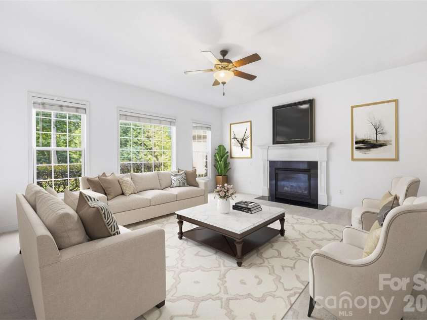 1703 Caddy Court, Matthews, NC 28104.  MLS# CAR4392423, YatesRealty ID 39056. Family Room - Virtually Staged