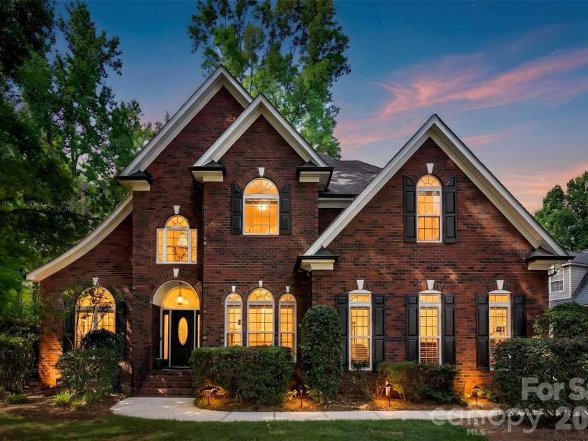 1703 Caddy Court, Matthews, NC 28104.  MLS# CAR4392423, YatesRealty ID 39056. Front Exterior - Twilight